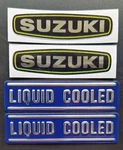 Suzuki GT750 2 Kettle Liquid Cooled (blue) & Engine Casing Decals/emblems. Fixed Price $54.95.