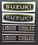 Suzuki GT750 2 Kettle Liquid Cooled (black) & Engine Casing Decals/emblems. Fixed Price $54.95.